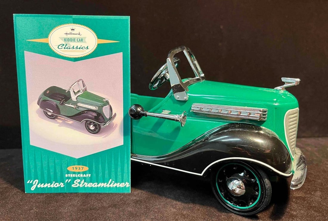 1999 Kiddie Car Classic "1937 Steelcraft 'Junior' Streamliner" With Hallmark Card: This lot contains a 1999 Kiddie Car Classic "1937 Steelcraft 'Junior' Streamliner" With Hallmark Card. It is approx 7 1/4" x 2 3/4" x 3 3/4" and it weighs about 1.3lbs. Ove