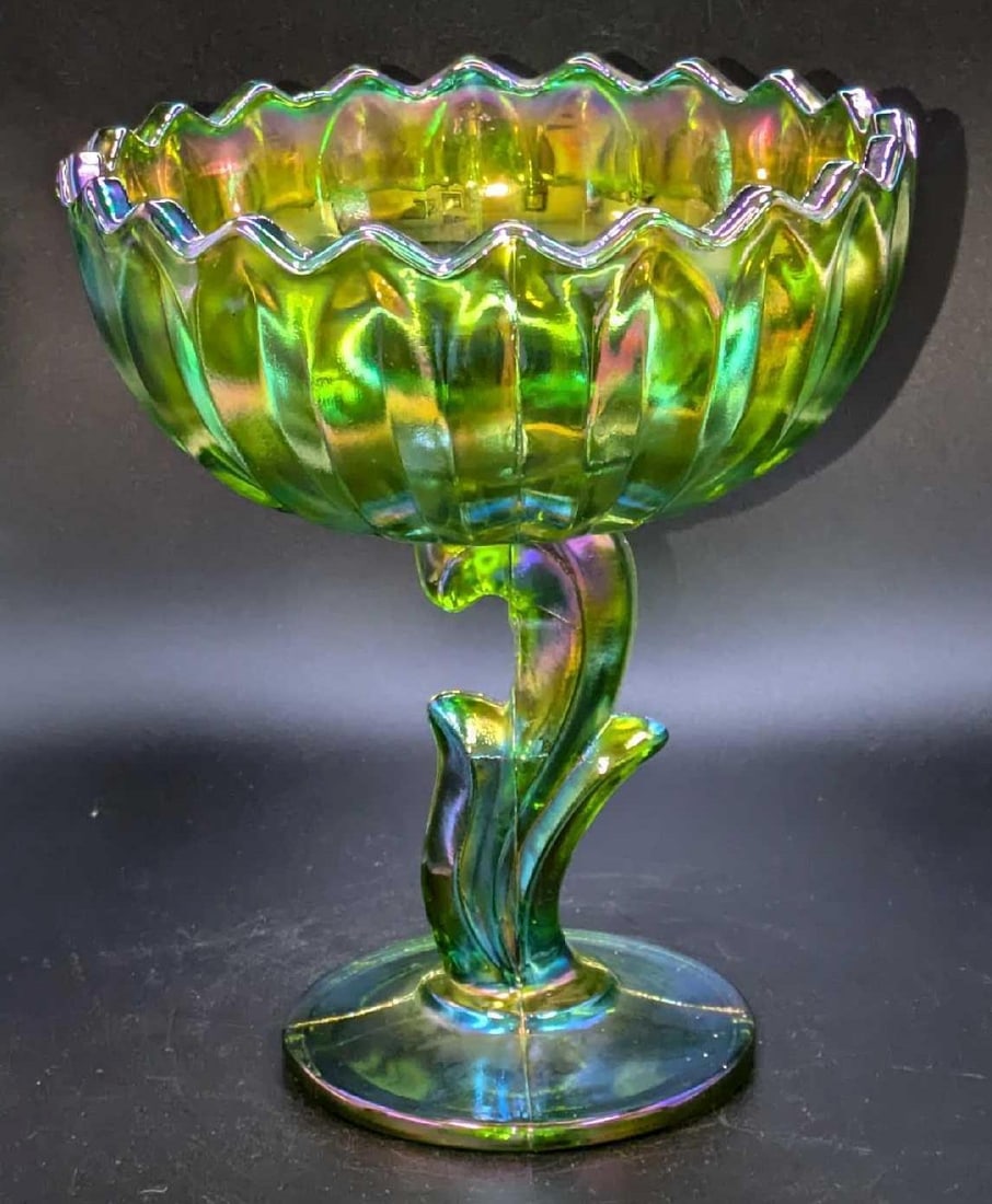 Vintage Indiana Glass Iridescent Lotus Blossom Compote: Vintage Indiana Glass Iridescent Lotus Blossom Compote. This is approx 6 1/8" x 6 1/8" x 7 1/2" and it weighs 1.78lb. The glass is a little rough where it was pressed together.