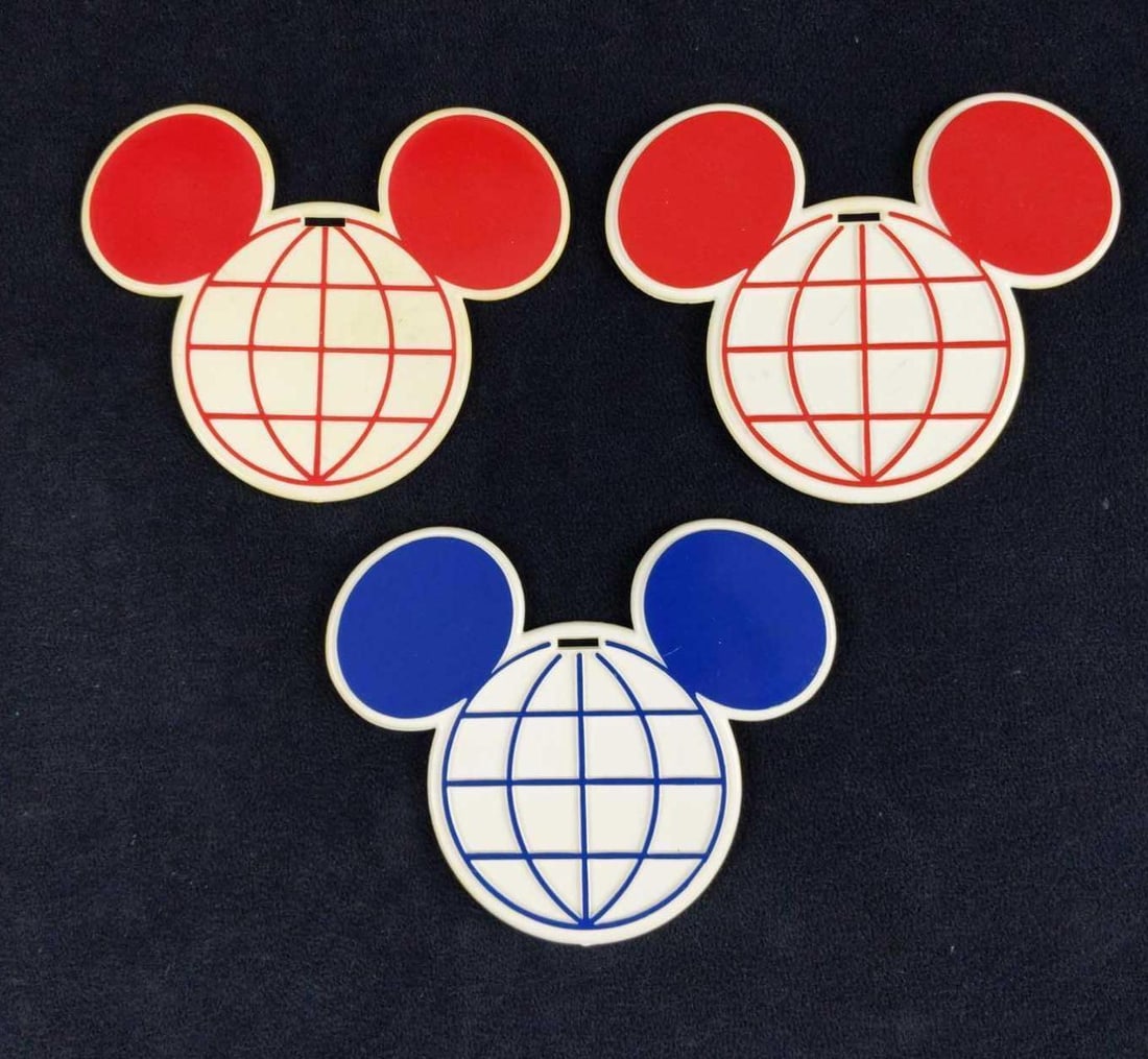 Three Vintage Walt Disney World Luggage Golf Tags: Three vintage Walt Disney Golf Resort (Now the Military Owned 'Shades of Green' resort.) Die-cut Hard Plastic Mickey Mouse Golf Bag Tags. Please note. these could also be used as luggage tags.