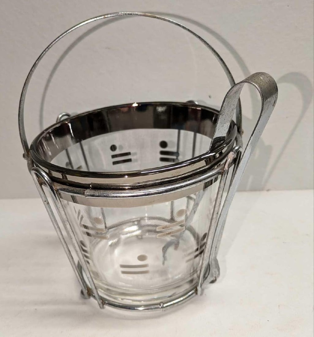 Dorothy Thorpe Style Silver Rimmed Ice Bucket: Dorothy Thorpe Style Silver Rimmed Ice Bucket. This is approx 6 1/4" x 6 1/4" x 5 1/4" and it weighs 2.30lbs.The bucket has some scratches and markings. There are some smudges and light su