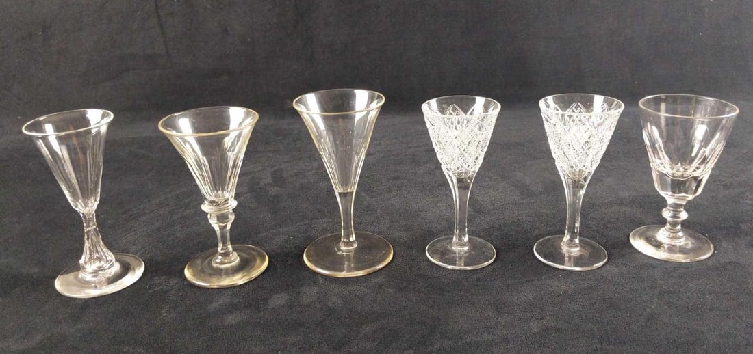 6 Assorted Crystal Glass Sippers Port Sherry Glassses B: This lot includes six different sippers (2 are the same!), sherry glasses port glasses, and other small wine glasses. Some are crystal and some are glass. Most are not marked. Glasses range from 2 1/2