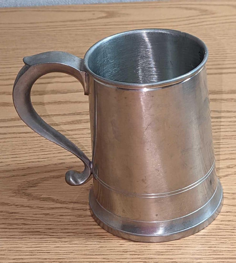 Vintage Old Newbury Pewter Tavern Stein Mug: Vintage Old Newbury Pewter Tavern Stein Mug. Is approx 6" x 4" x 5 1/2" and it weighs 1.37lb. The vintage mug has some signs of wear, scratches, and markings. Please see the images as they
