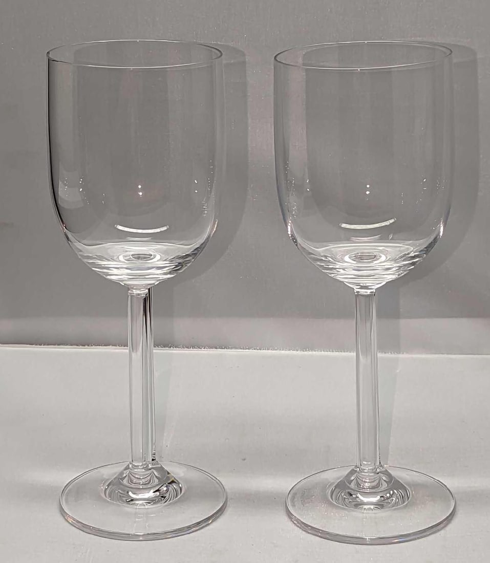2 7" Rosenthal Crystal Double Stem Wine Glasses: 2 7" Rosenthal Crystal Double Stem Wine Glasses. Part of the "Studio Line" series. Each glass is approx 2 5/8" x 2 5/8" x 7 1/2" and together they weigh 0.82lb. One of the glas