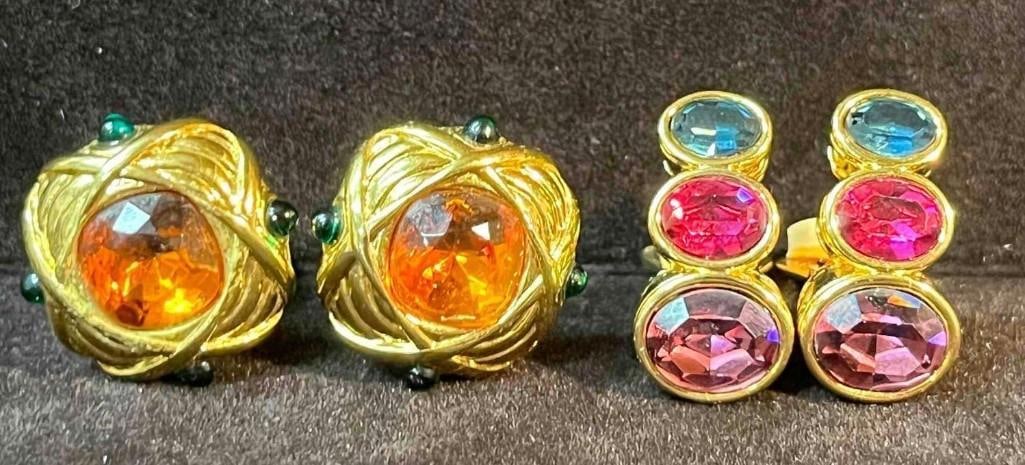 Two Pairs Of Nolan Miller Gold Tone Clip On Earrings: This lot contains Two Pairs Of Nolan Miller Gold Tone Clip On Earrings. The bundle fits in a small 3 3/4" x 2 1/4" plastic bag and altogether weighs about 0.06lbs. Overall the Two Pairs of Nol