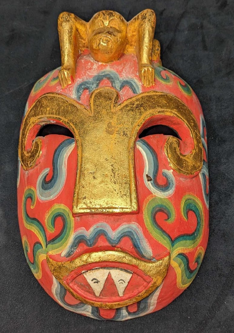 Vintage Wooden Demon Wall Art Mask: Vintage Wooden Demon Wall Art Mask. This is approx 8 3/4" x 3 3/4" x 12 3/4" and it weighs 1.25lb. The maker and date of creation are unknown. There is a crack on the back and a chip on th