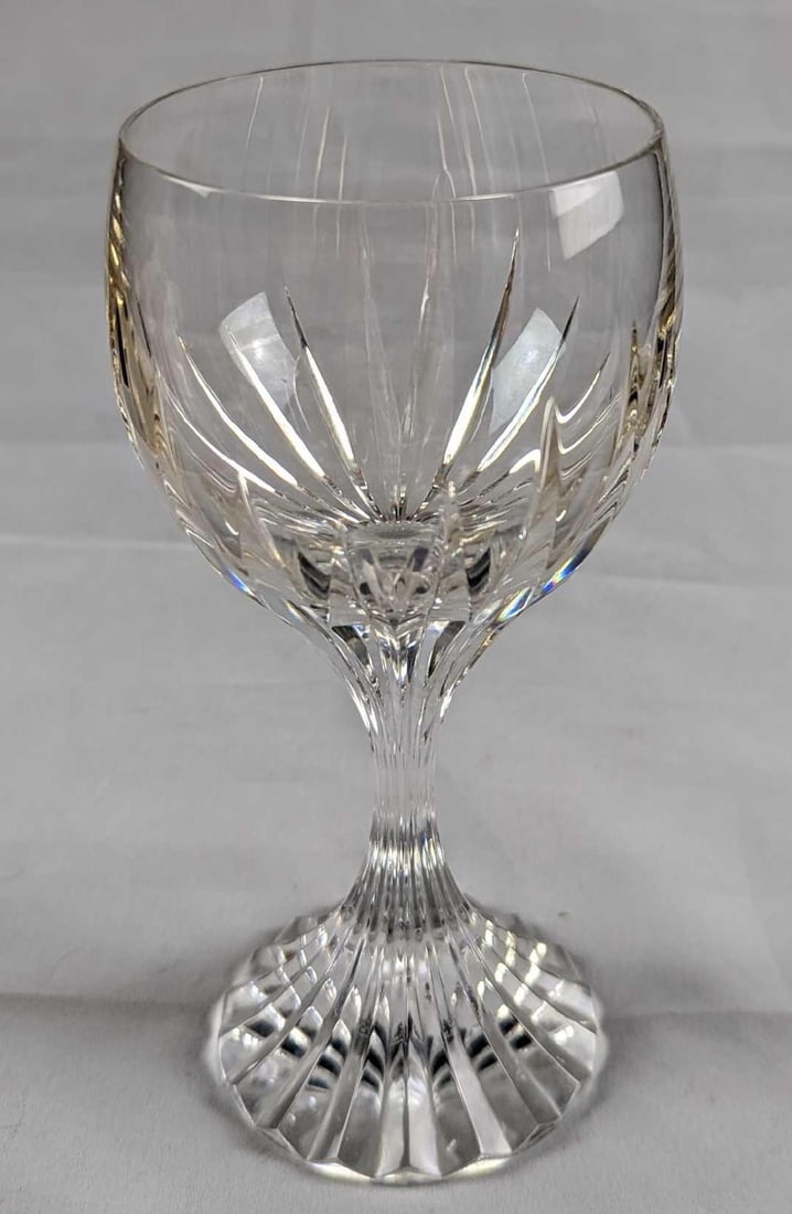 Baccarat Crystal Massena Water Goblet: This, in turn, puts the smoothness of the upper bowl in sharp relief. The intricate detailing gives the Massena glass the appearance of impressive heft, as if it were a modern-day chalice. The polishe