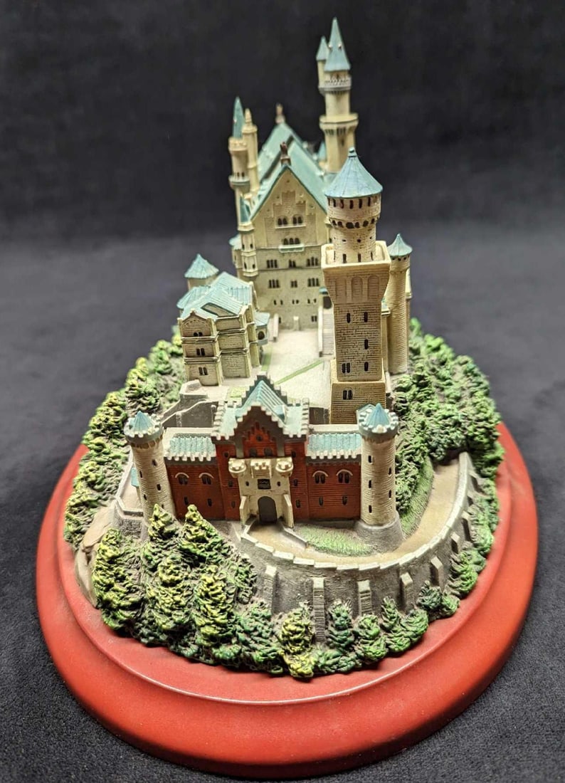 Lenox Great Castles Neuschwanstein Castle Sculpture: Lenox Great Castles Neuschwanstein Castle Sculpture. This was released in 1993 and is made of hand-painted resin. The castle is approximately 10" x 8" x 7 3/4" and weighs 4.67 lbs. The cas