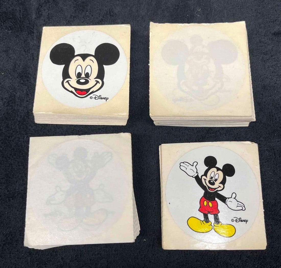 4 Stacks Of Disney Mickey Mouse Stickers: This lot contains a 4 Stacks Of Disney Mickey Mouse Stickers. Each stack is approx 2 1/4" x 2 1/4" and it weighs about 0.3lbs. Overall the is in good used condition with some light wear from u