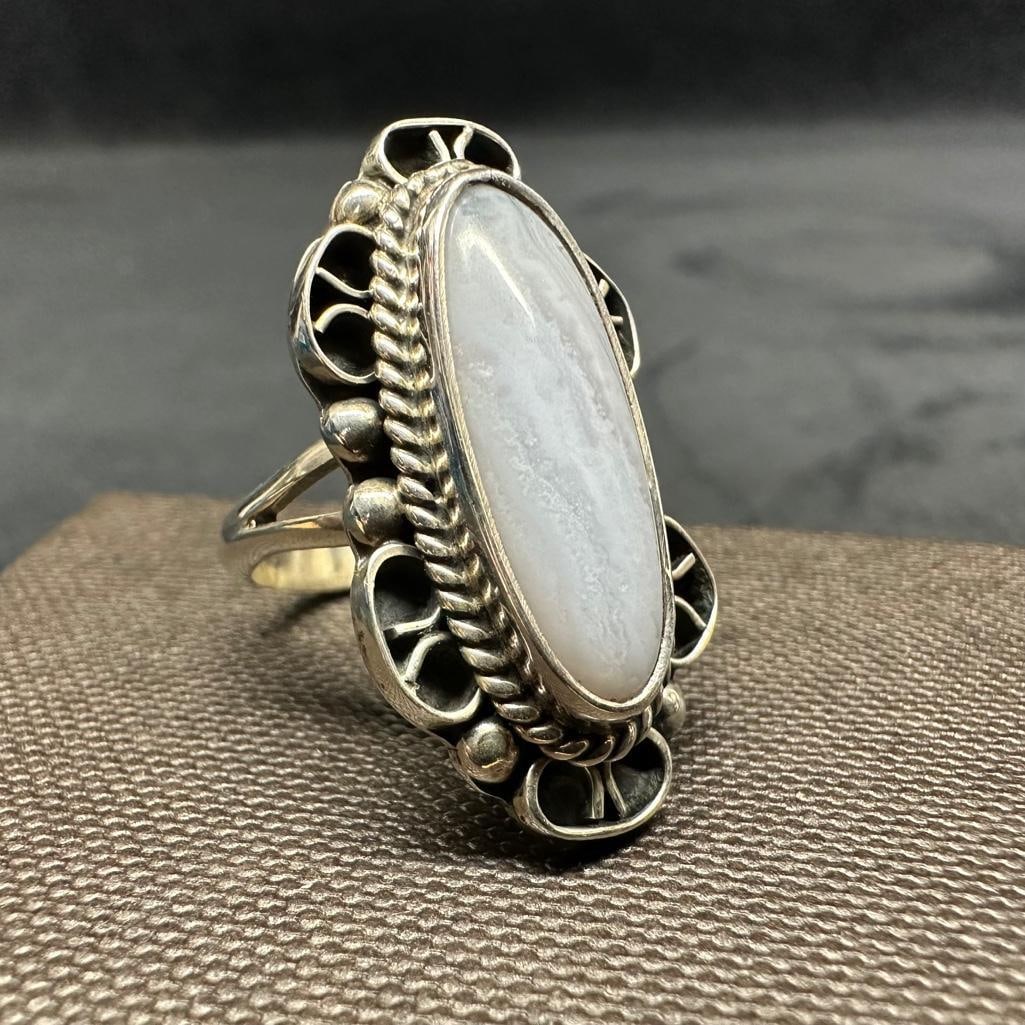 Sterling Agate Cocktail Ring: This piece of jewelry has been tested and researched prior to listing. Please view all our pictures they are part of our description. DETAILS: Metal - Sterling Silver Color - Silver Stones - Agate Ha