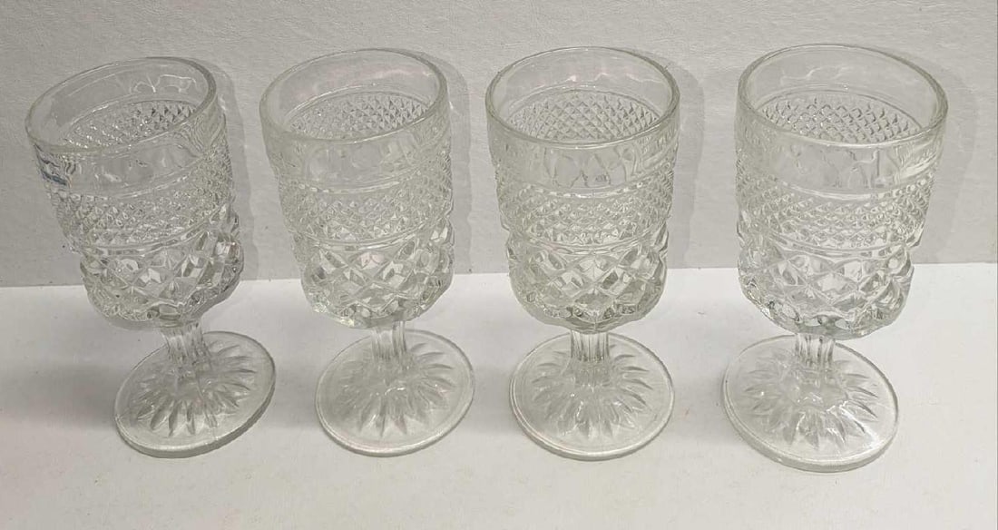 4 Vintage Wexford Claret Waffle Goblets: 4 Vintage Wexford Claret Waffle Goblets. Each is approx 3" x 3" x 6 5/8" and it weighs 3.70lbs. The goblets have no chips or cracks.