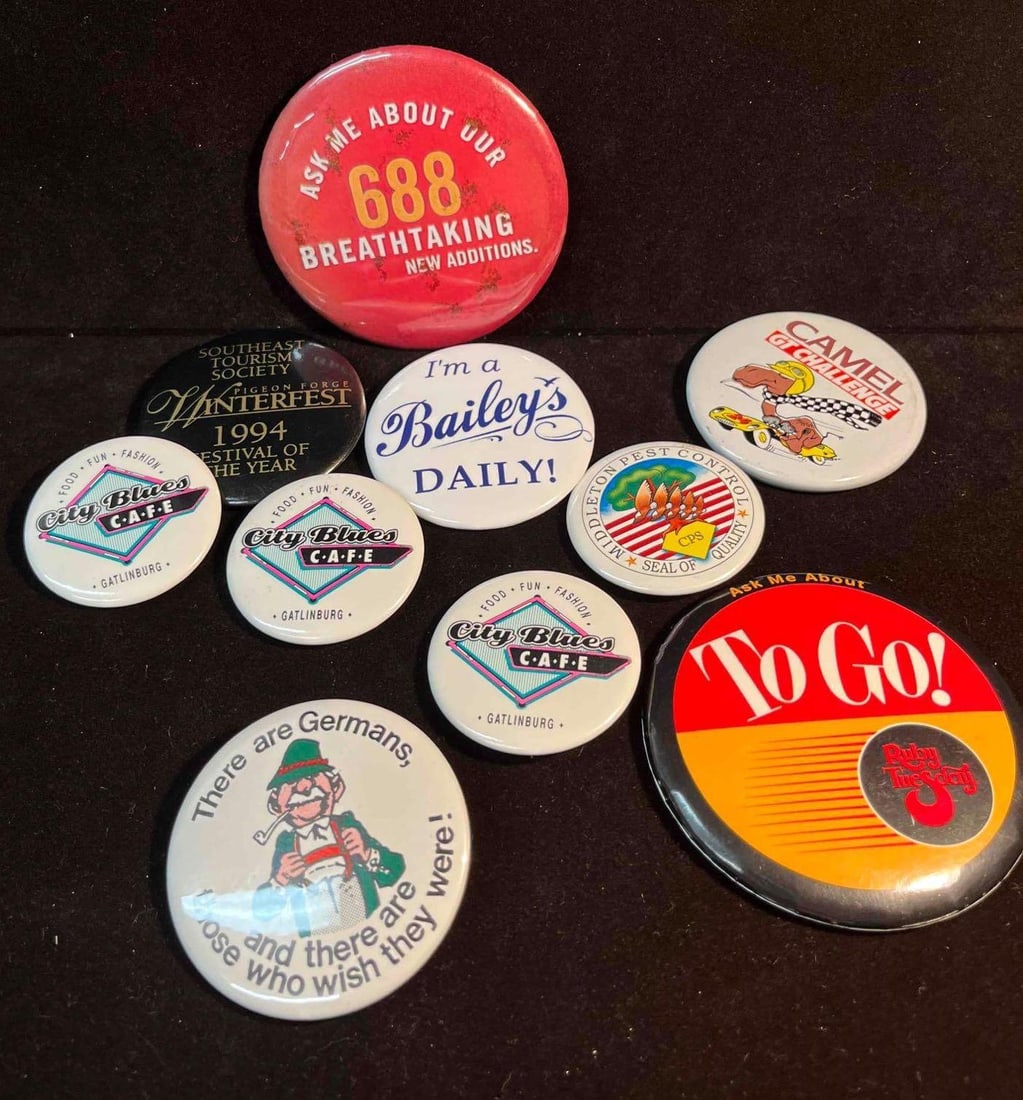 Random Bundle of Pins (F18): This lot contains a Random Bundle of Pins (F18). The pins/buttons fit in approx 6" x 7 1/4" plastic bag and altogether they weigh about 0.2lbs. Overall the pins are in average used condition w