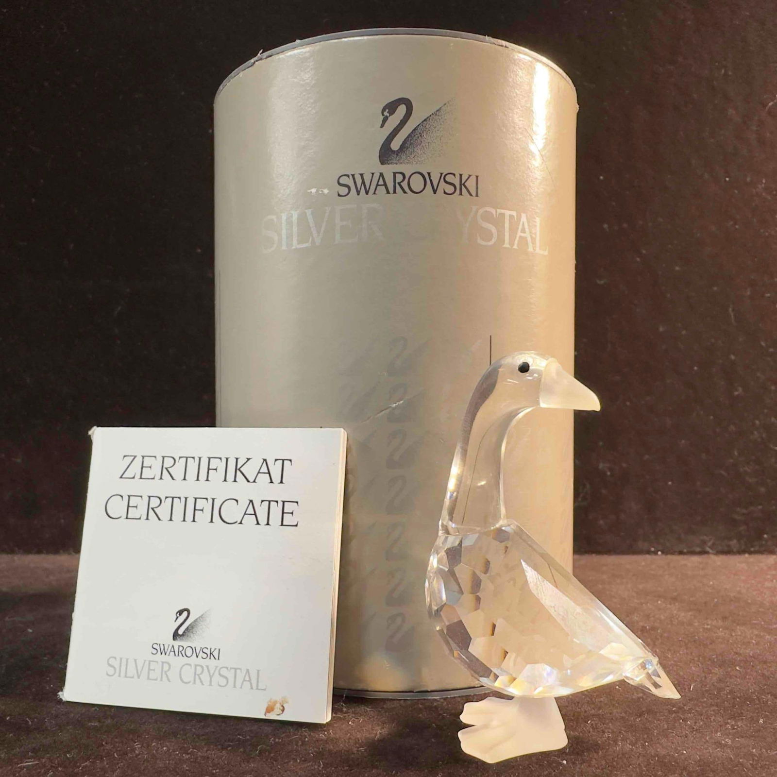 Swarovski Crystal Tom Gosling Mother Goose 7613 NR 000 001: Swarovski Crystal Figurine Goose. This figure is a beautiful crystal glass art Tom Gosling Mother Goose from Swarovski Crystal. The item features a beautifully etched art glass piece showcasing a Goos