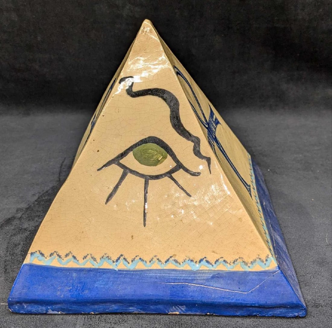 Vintage Handpainted Egyptian Pyramid With Egyptian Symbols: Vintage Handpainted Egyptian Pyramid With Egyptian Symbols. This figurine appears to be a plastic or resin over a ceramic or plaster body. It has symbols like the Eye Of Horus, Ankh, and others. This