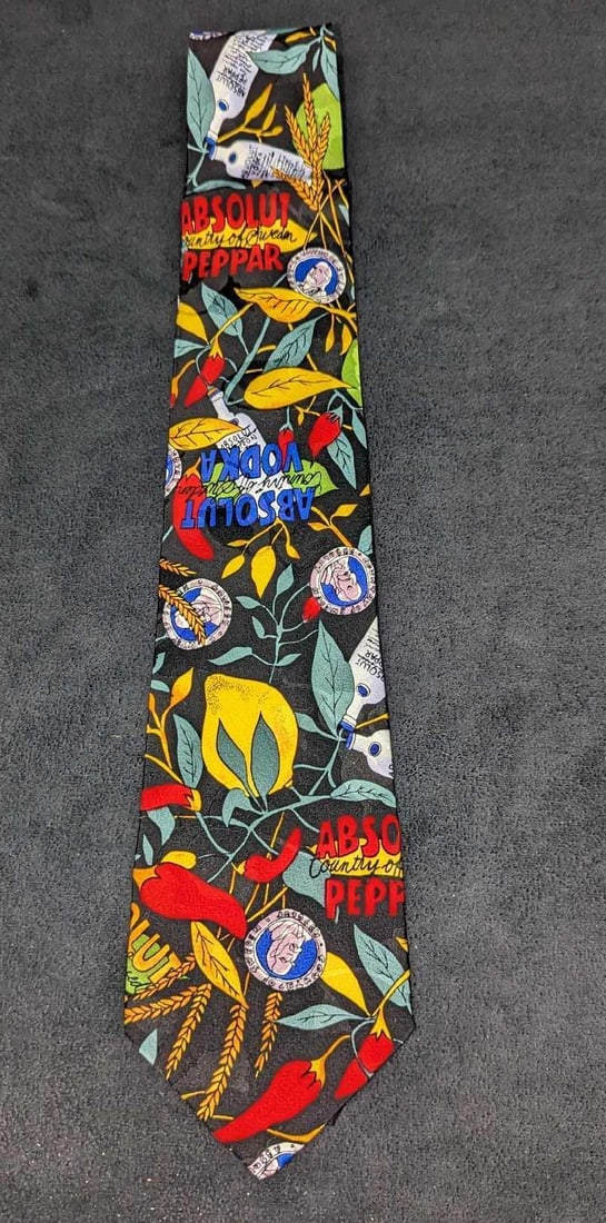 Absolut Vodka Nicole Miller Silk Tie New: Absolut Vodka Nicole Miller Silk Tie New. 100% silk tie designed by artist Nicole Miller, for Absolut Vodka in the 1990s. This silk tie is still in the original packaging and has never been used or wo