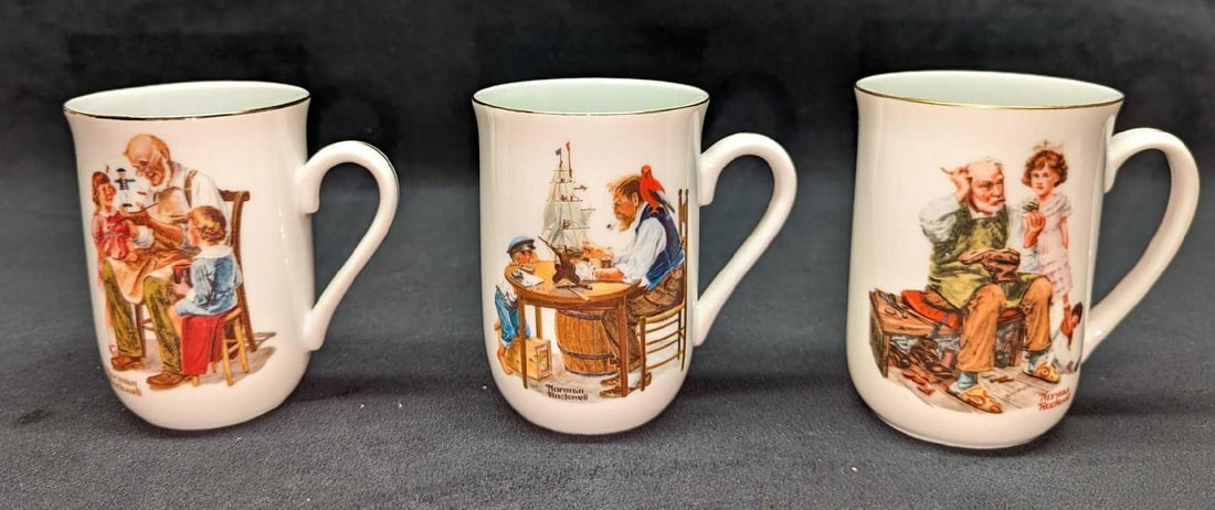 3 Norman Rockwell Museum Porcelain Cups A: 3 Norman Rockwell Museum Porcelain Cups A. This set includes: (1) The Cobbler. (1) The Toymaker. (1) For A Good Boy. Each is approx 4" x 2 3/4" x 4" and the total weight is 1.44lb. The cups are in a g