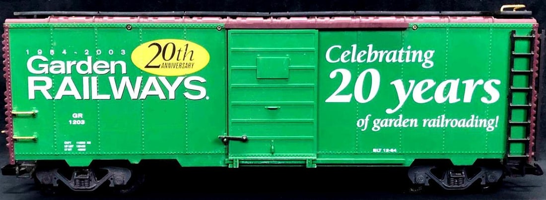 Garden Railways Magazine 20th Anniversary Boxcar: This lot contains a Garden Railways magazine 20th anniversary boxcar. This box car is made of plastic and can be operated on knuckle couplers. The wheels are metal while the axil is plastic. It is app