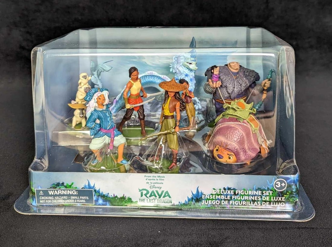 Disney Raya And The Last Dragon Deluxe Figure Set B: Disney Raya And The Last Dragon Deluxe Figure Set B. Comes with eight detailed PVC figures based off characters from Disney's Raya and the Last Dragon. All come new in its original box which is ap