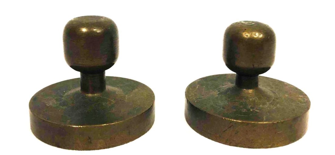 2 Brass Paperweights: This lot contains 2 Brass Paperweights. Each paperweight is approx 1 3/4" x 1 3/4" x 1 1/2" and altogether they weigh about 0.7lbs. Overall the paperweights are in good used condition with
