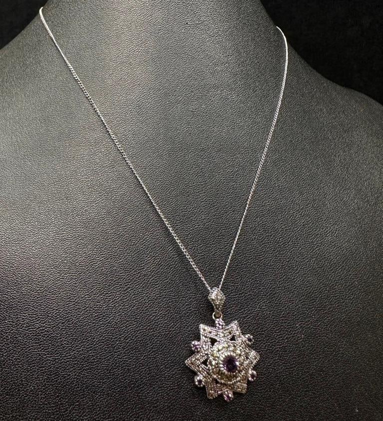 Sterling Amethyst & Marcasite Pendant Necklace: This piece of jewelry has been tested and researched prior to listing. Please view all our pictures they are part of our description. DETAILS: Metal - Sterling Silver Color - Silver Stones - Amethyst