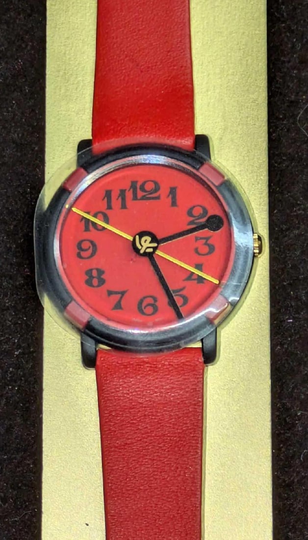 LimitedEdition John Zaboyan Red & Black Watch: LimitedEdition John Zaboyan Red & Black Watch. Water resistant 100 ft. Stainless steel back. Does not appear to have been used. Still has plastic protective cover watch face. Leather band. Comes i