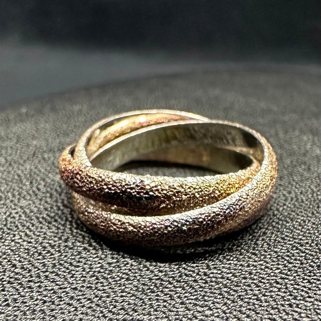 Sterling Triple Interlocking Stacked Ring: This piece of jewelry has been tested and researched prior to listing. Please view all our pictures they are part of our description. DETAILS: Metal - Sterling Silver Color - Silver Stones - Hallmark