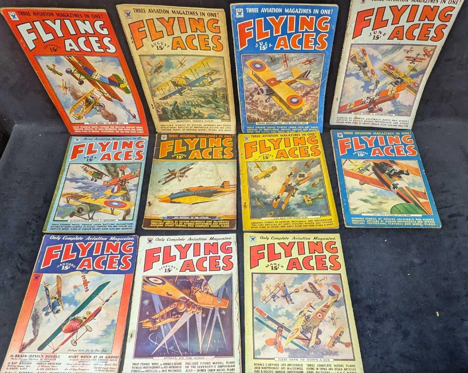 11 1934 Flying Aces Magazine: 11 1934 Flying Aces Magazine. This lot is missing April. Each of the magazines is approx 8 1/2" x 1/4" x 11 1/2" and it weighs 4.50lbs. The covers have shelf wear, tape, handwriting and th
