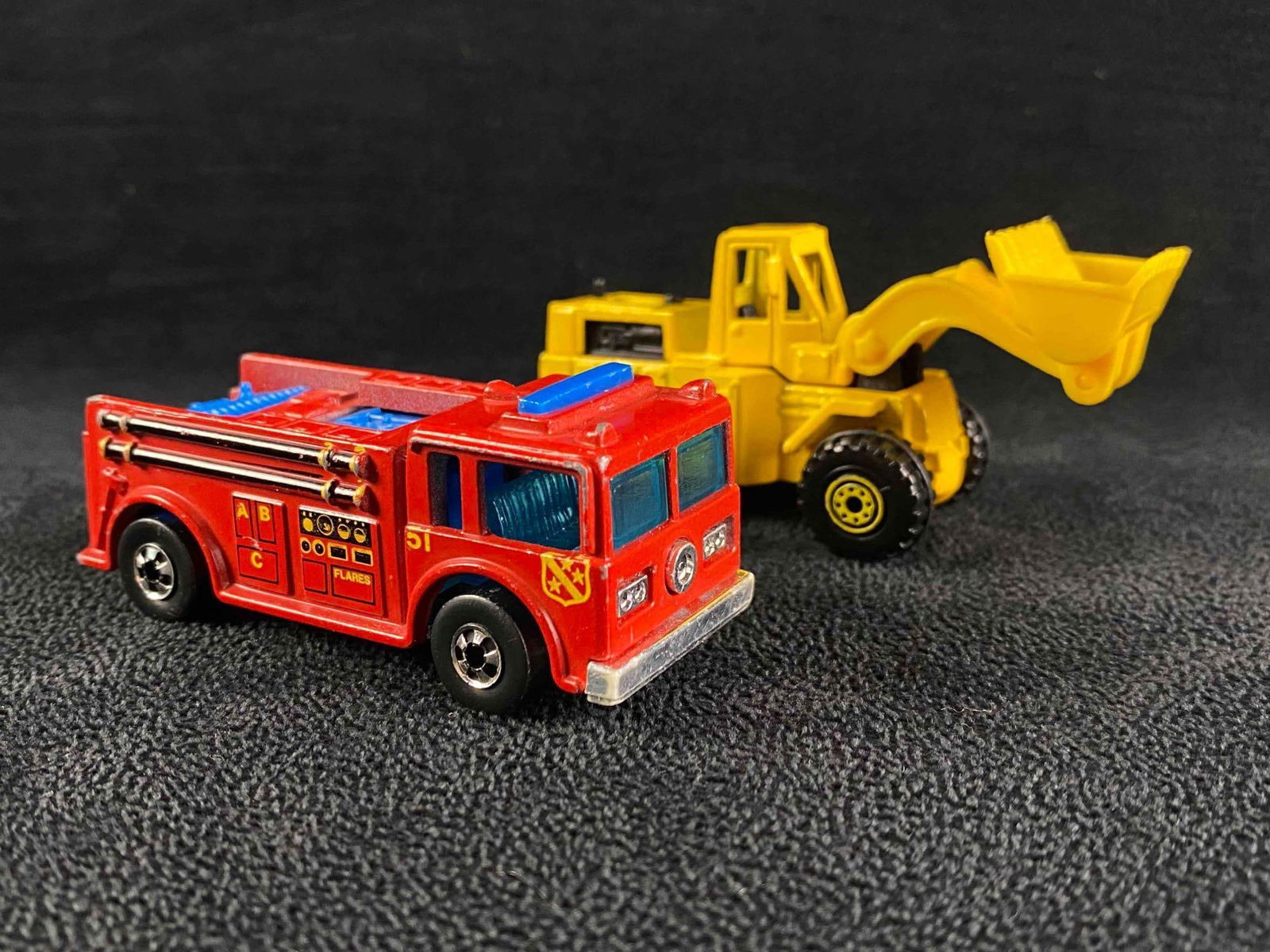 Hot Wheels Fire-Eater & Wheel Loader: Hot Wheels Fire-Eater & Wheel Loader Vintage Hot Wheels "Fire-Eater" firetruck and "Wheel Loader" front-end loader. Both are in good condition with no known damage, and only some