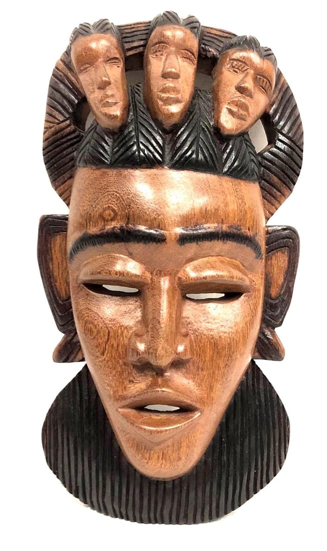 Handmade African Carved Wood Tribal Mask: Handmade African Carved Wood Mask. Item does not have a hook for hanging on wall. The mask is approximately 11-1/2" x 6" x 2-1/2" and weighs about 1.0lbs. Overall the Handmade Mask is in g
