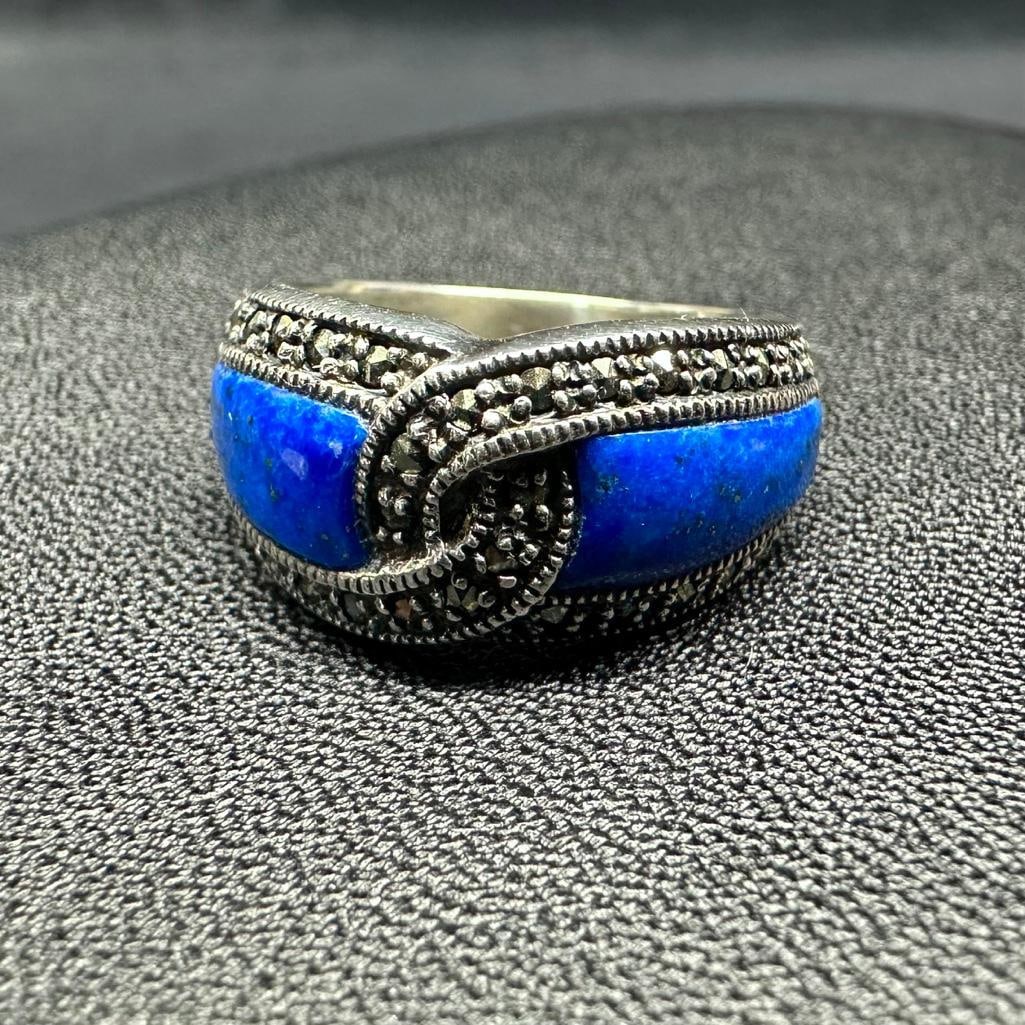 Sterling Marcasite Lapis Ring: This piece of jewelry has been tested and researched prior to listing. Please view all our pictures they are part of our description. DETAILS: Metal - Sterling Silver Color - Silver Stones - Marcasite