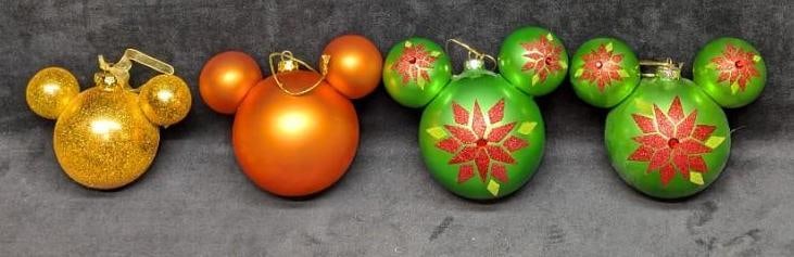 4 Mickey Mouse Colorful Glass Ball Ornaments: 4 Mickey Mouse Colorful Glass Ball Ornaments.This lot includes: (2) Green & Red Ornament. This is approx 6" x 4" x 6". (1) Orange Ornament. This is approx 6" x 4" x 6".