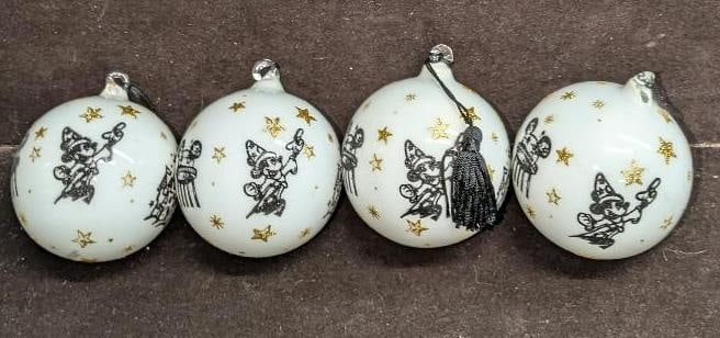 4 Retired 4 Disney World Parks Glass Ornaments: 4 Retired 4 Disney World Parks Glass Ornaments. This ornament is marked with each of the different Disney World Parks (at the time, the symbol for Hollywood Studios has changed a few times). Each is a