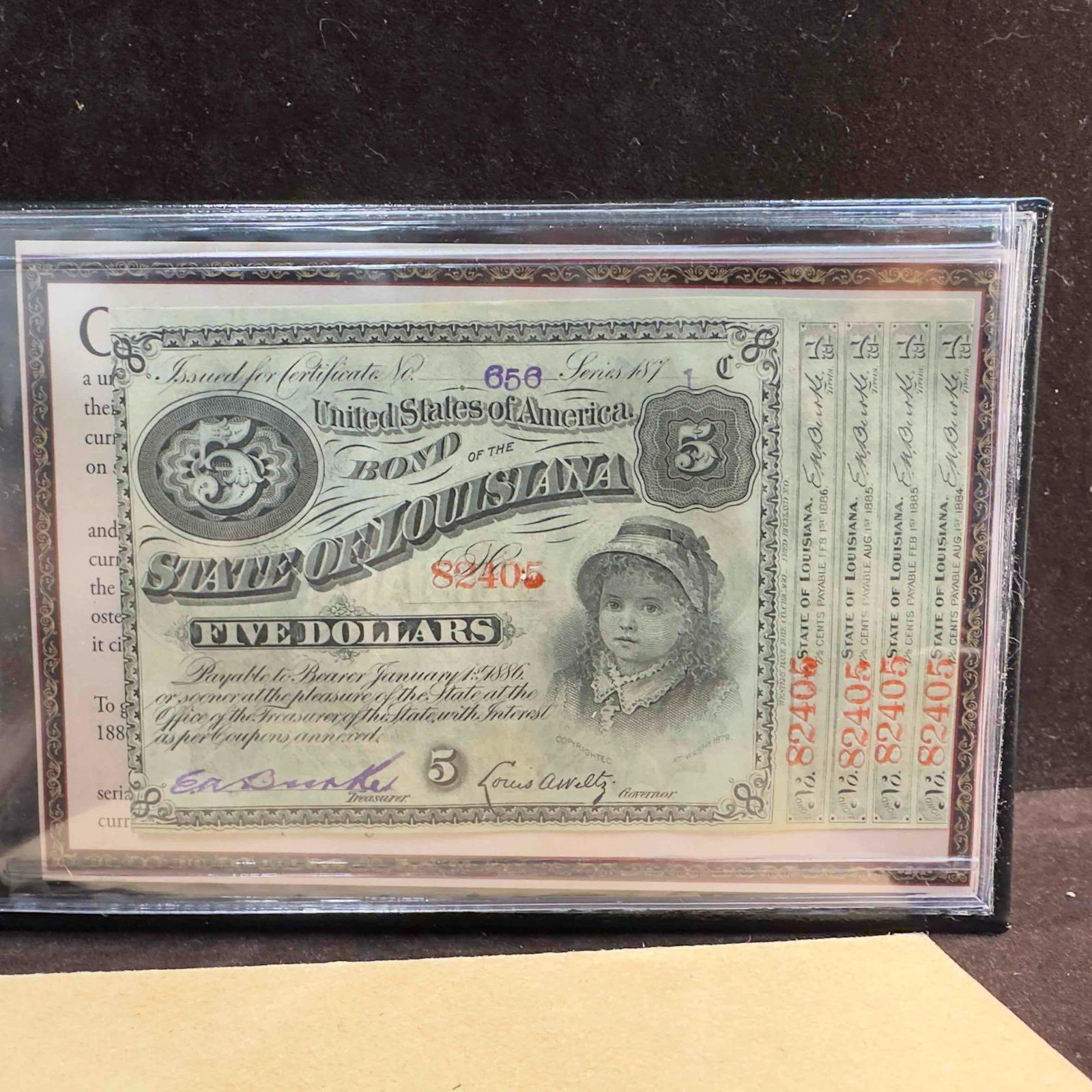 1870's Louisiana Baby Bond $5 Five Dollars Obsolete Currency High Grade: 1870's Louisiana Baby Bond $5 Five Dollars Obsolete Currency High Grade. This obsolete currency $5 five dollar baby bond comes in a plastic sleeve with booklet. This item is in good pre-owned, pre