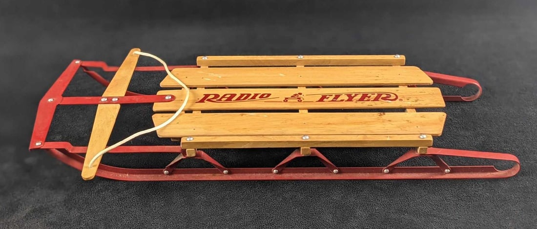 Radio Flyer Mini My Little Red Sleigh: This is a mini version of the ever popular Radio Flyer Sleigh. This is approx 16" x 8" x 2" and it weighs 0.56lb. The mini sleigh is in a good, used condition with some signs of wear and m
