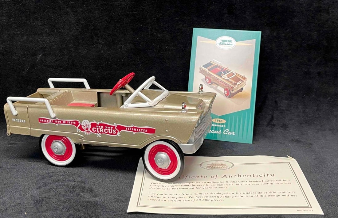 1994 Kiddie Car Classic "Murray Circus Car" With COA & Hallmark Card: This lot contains a 1994 Kiddie Car Classic "Murray Circus Car" With COA & Hallmark Card. It is approx 7" x 2 3/4" x 3 1/4" and weighs about 1.3lbs. Overall the Kiddie Car is i