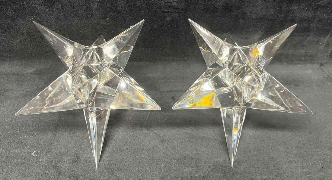 Vintage Rosenthal Kosta Sterne Crystal Star Candle Holders Designed By Vicke Lindstrand: This lot contains a pair of Vintage Rosenthal Kosta Sterne Crystal Star Candle Holders Designed By Vicke Lindstrand. Lindstrand was a Swedish glass designer. This pattern was most likely released duri