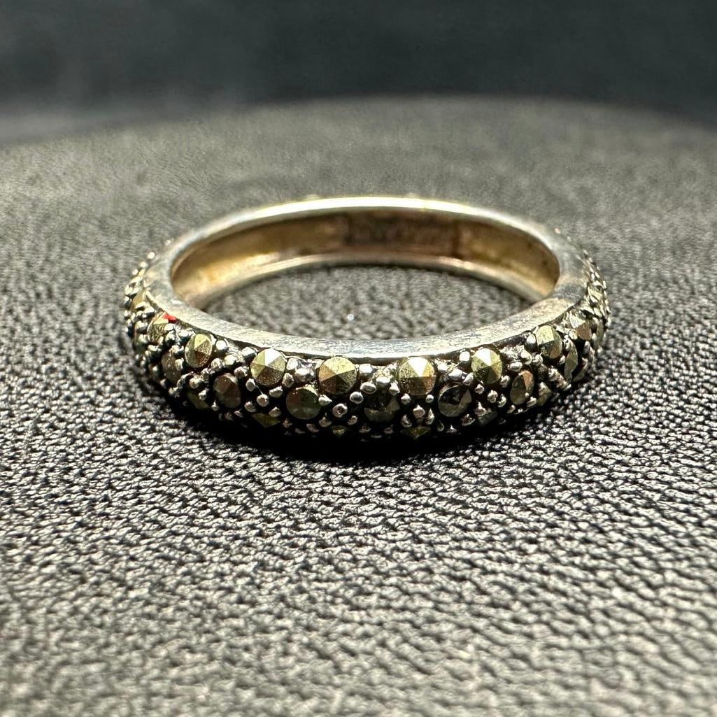 Sterling Marcasite Band Ring: This piece of jewelry has been tested and researched prior to listing. Please view all our pictures they are part of our description. DETAILS: Metal - Sterling Silver Color - Silver Stones - Marcasite