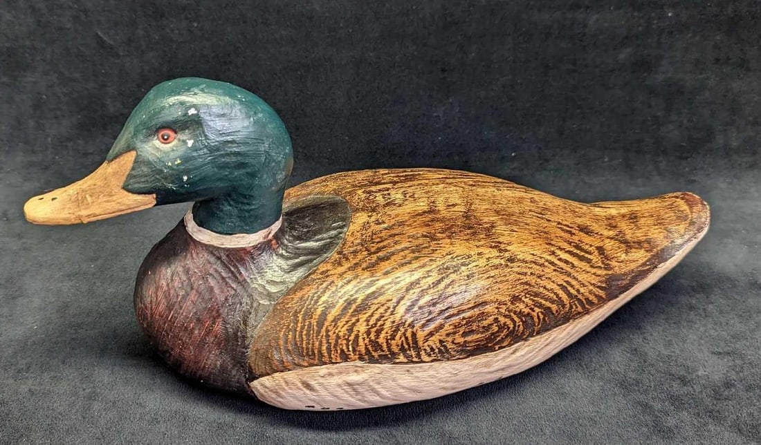 Hand Painted Wooden Duck Figurine: Hand Painted Wooden Duck Figurine. Is approx 13" x 6" x 6 1/2" and it weighs 1.76lb. The maker and date of creation is unknown. The duck has some paint-loss and signs of wear. Please see t