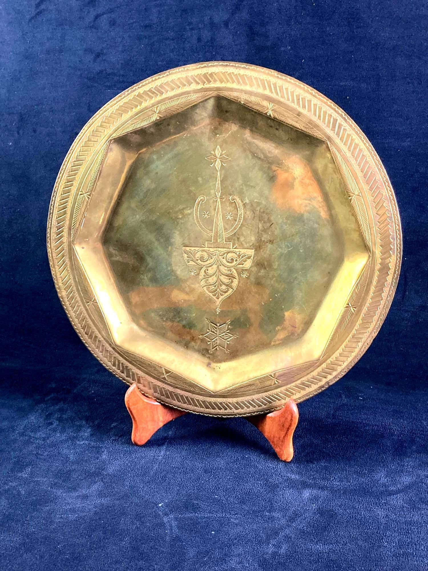 Gold Colored Plate: Up for auction is a recent estate find, a gold colored plate with various etchings and engravings on the underside. A date reads November 23, 1984 and the makers engraved their names as well. There is