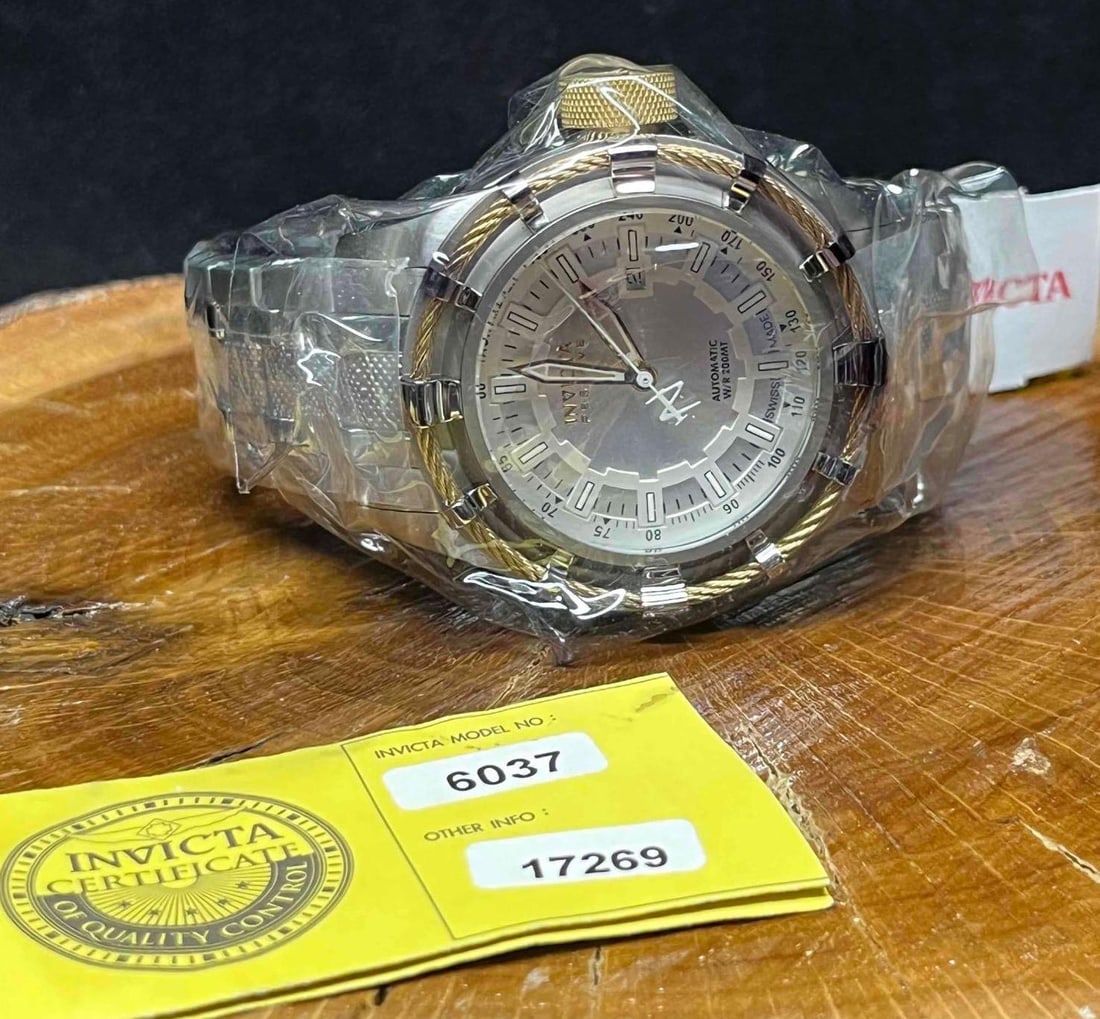 Invicta Reserve Stainless Steel Men's Watch Model #6037 In Original Packaging: This lot contains a Invicta Reserve Stainless Steel Men's Watch Model #6037 In the Original Packaging. Includes an Invicta Certificate of Quality Control. The box is approx 6" x 5 1/2" x 5