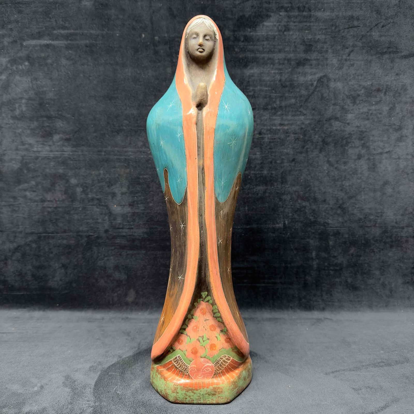 Virgin Mother Mary Praying Pottery Mexico Sculpture Statue: Virgin Mother Mary Praying Pottery Mexico Sculpture Statue. Pottery statue featuring Mary in a prayer pose. Etched into the bottom area of the sculpture is an artist signature, Angel Ortia G Mexico, p