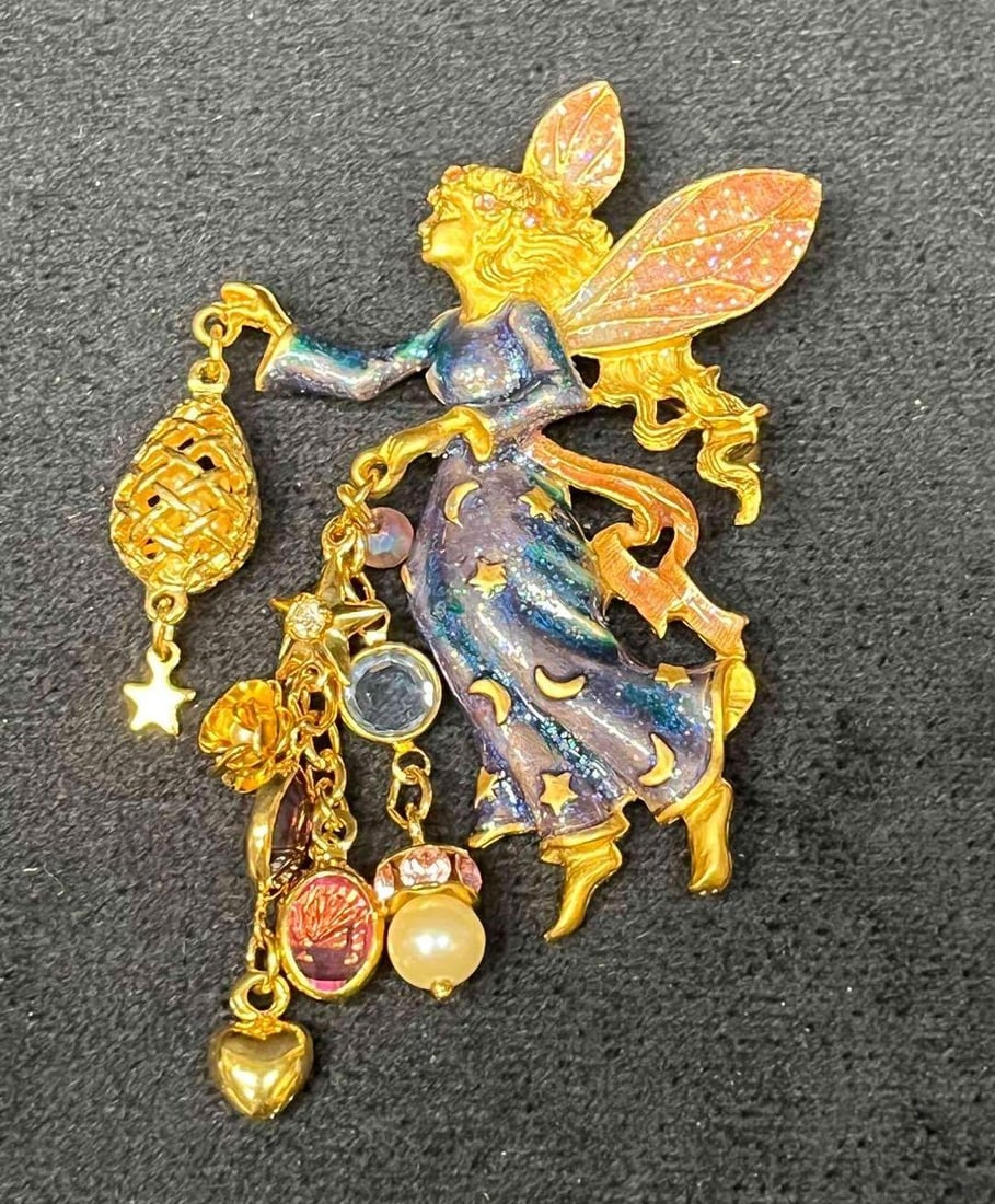 Signed Vintage Kirks Folly Twinkle The Tooth Fairy Brooch: This lot contains a Signed Vintage Kirks Folly Twinkle The Tooth Fairy Brooch. The Kirks Folly brand was established in 1979 in New York. The Brooch is approx 2 3/4" x 1 3/4" x 1/2". Total