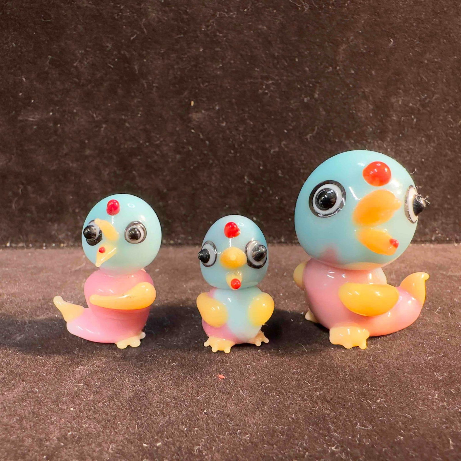 Bird Art Glass Blue Pink Duck Figure Sculpture Figurine Set of Three: Bird Art Glass Blue Pink Duck Figure Sculpture Figurine Set of Three. Beautiful pink, blue, and orange colors featured in these glass pieces. Unknown maker no identifying markings. No chips, cracks, o