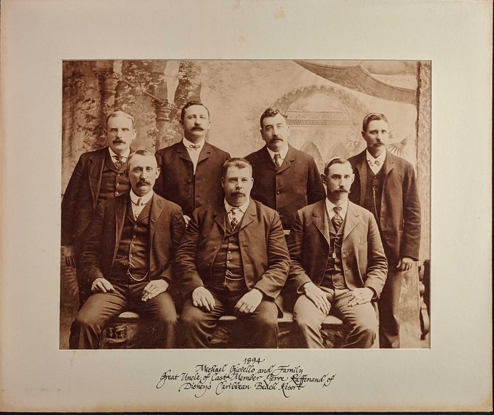 Walt Disney Cast Member Ancestor Mustached Gentlemen Photo: Here is a blown-up copy of an old photo from 1894. It states it as "1894 Michael Gioiello And Family Great Uncle Of Cast Member Pierre Raffenand Of Disney's Carribean Beach Resort". It app