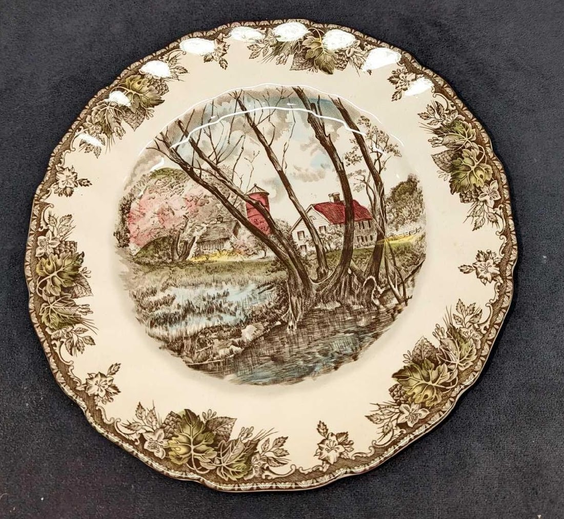 Willow By The Brook Friendly Village Large Dinner Plate JB: Willow By The Brook Friendly Village Large Dinner Plate JB. This retired series of fine china was released by the Johnson Brothers, from the year 1953 to the year 2003. The large dinner plate is appro