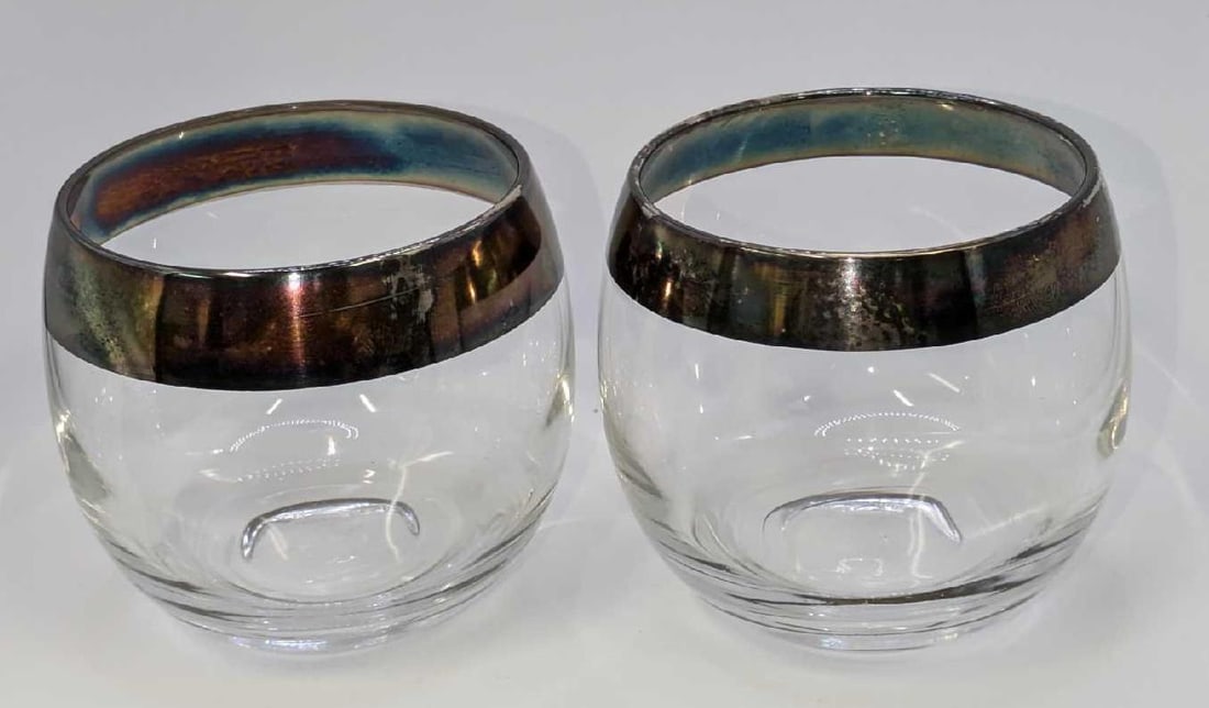 2 Vintage Silver Rimmed Tumbler Glasses Dorothy Thorpe A: 2 Vintage Silver Rimmed Tumbler Glasses Dorothy Thorpe A. Each glass is approx 3" x 3" x 2 5/8" and the total weight is 0.61lb. The glasses have no chips or cracks.