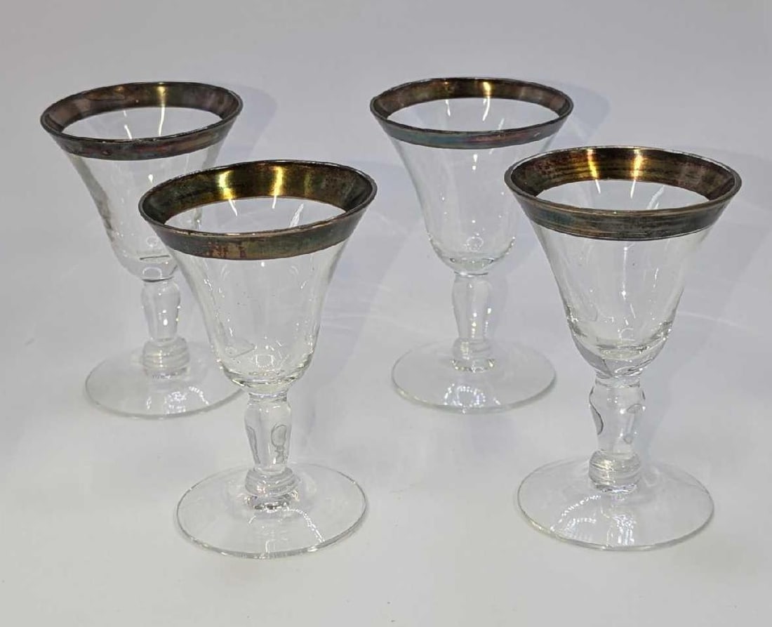 4 Vintage Silver Rimmed Cordial Glasses Dorothy Thrope A: 4 Vintage Silver Rimmed Cordial Glasses Dorothy Thrope A. Each is approx 2" x 3' x 2" and the total weight is 0.34lb. The maker and date of creation are unknown. The glasses have no chips 