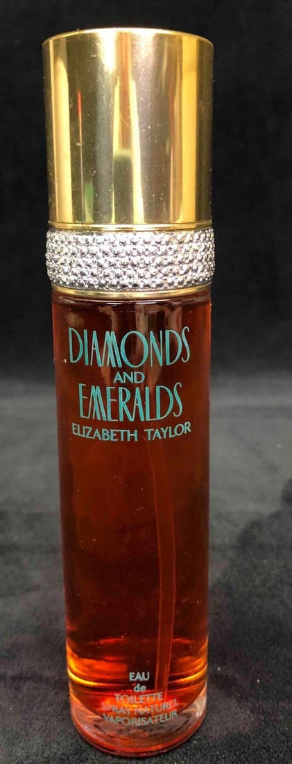 Elizabeth Taylor Diamonds & Emeralds Perfume: This lot contains a 33 Fl OZ. bottle of Elizabeth Taylor Diamonds & Emeralds perfume. Made and distributed in the U.S.A by Parfumes International LTD. The bottle weighs about 0.6lbs. The bottle wa