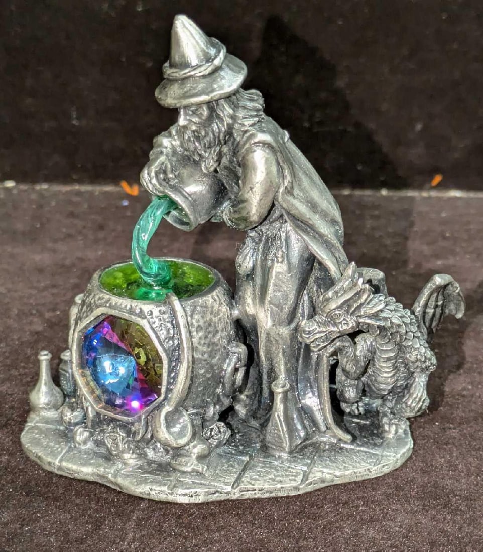The Healing Potion Wizard Pewter Figurine S. Riley: The Healing Potion Wizard Pewter Figurine S. Riley.This is approx 3 3/4" x 2 1/4" x 3 3/4" and it weighs 1.83lb. The figurine has some light signs of wear.