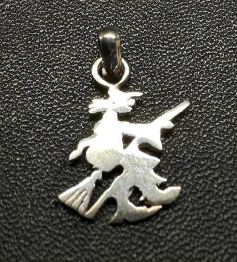 Small Sterling Witch Pendant: This piece of jewelry has been tested and researched prior to listing. Please view all our pictures they are part of our description. DETAILS: Metal - Sterling Silver Color - Silver Stones - none Hall