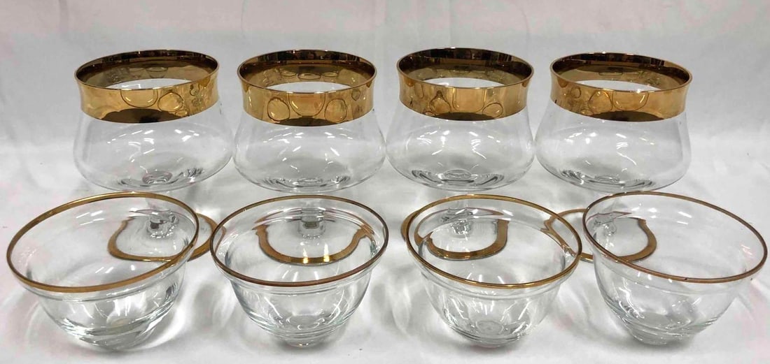 Gold/Crystal Shrimp Cocktail Serving Glass Set Of 8: This lot contains a set of 8 gold/crystal shrimp cocktail serving glasses. There are 4 small glasses for ice and 4 glasses to hold the ice glass and shrimp. All items in the set were made in Romania. 